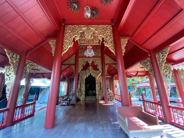 A view of the Lanna Pavilion's interior with the Buddha image as its focal point